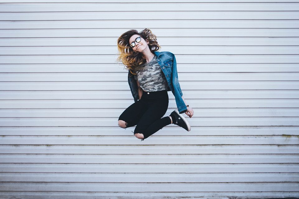 Image, Girl jumping for joy.