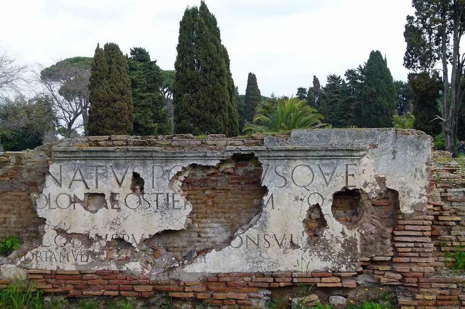 Image, Latin writing on an old roman ruin.